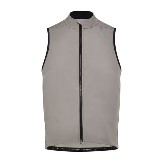 Studio-shot-of-the-taupe-grey-Luca-cycling-gilet-on-a-while-background--it-features-a-high-collar-full-black-zipper-the-subtle-grey-LUCA-logo-on-the-chest-and-a-prominnt-reflctive-lighting-bolt-graphic-on-the-shouler-The-hem-has-a-reflective-band-visible-along-the-bttom-edge