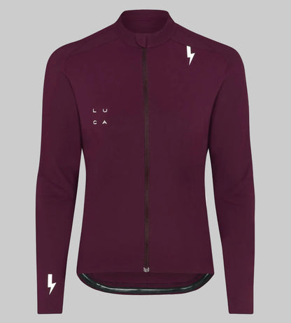 Front-view-of-a-burgundy-long-sleeve-full-zip-cycling-jersey-with- the-LUCA-logo-and-a-white-lightning-bolt-on-the-chest