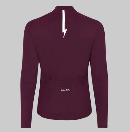 Back-view-of-a-burgundy-long-sleeve-cycling-jersey-with-white- lightning-bolt-graphic-on-the-neck- and-the-LUCA-logo-above-the-rear- pockets