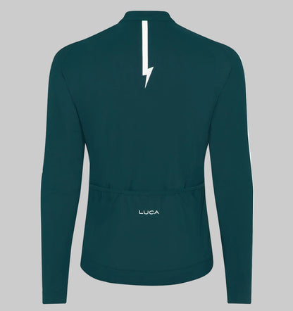 Back-view-of-a-teal-long-sleeve- cycling-jersey-with-a-reflective-white-lightning-bolt-strip-and-the- LUCA-logo-above-the-rear-pockets