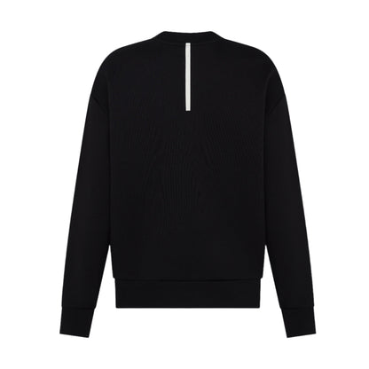 Back-view-of-a-black-crewneck- sweatshirt-with-a-subtle-reflective- vertical-white-stripe-detail-on-the- upper-back-Minimalist-women's- athletic-layering-piece