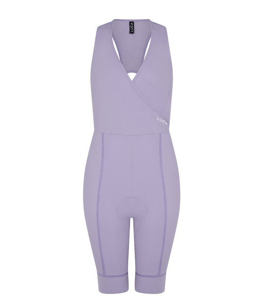 Road All-In-One-Lilac-hover-displayed-from-the-front- showcasing-the-unique-surplice-upper-body-The-shorts-have- contoured-stitching-and-a-LUCA-tag-on-the-upper-strap