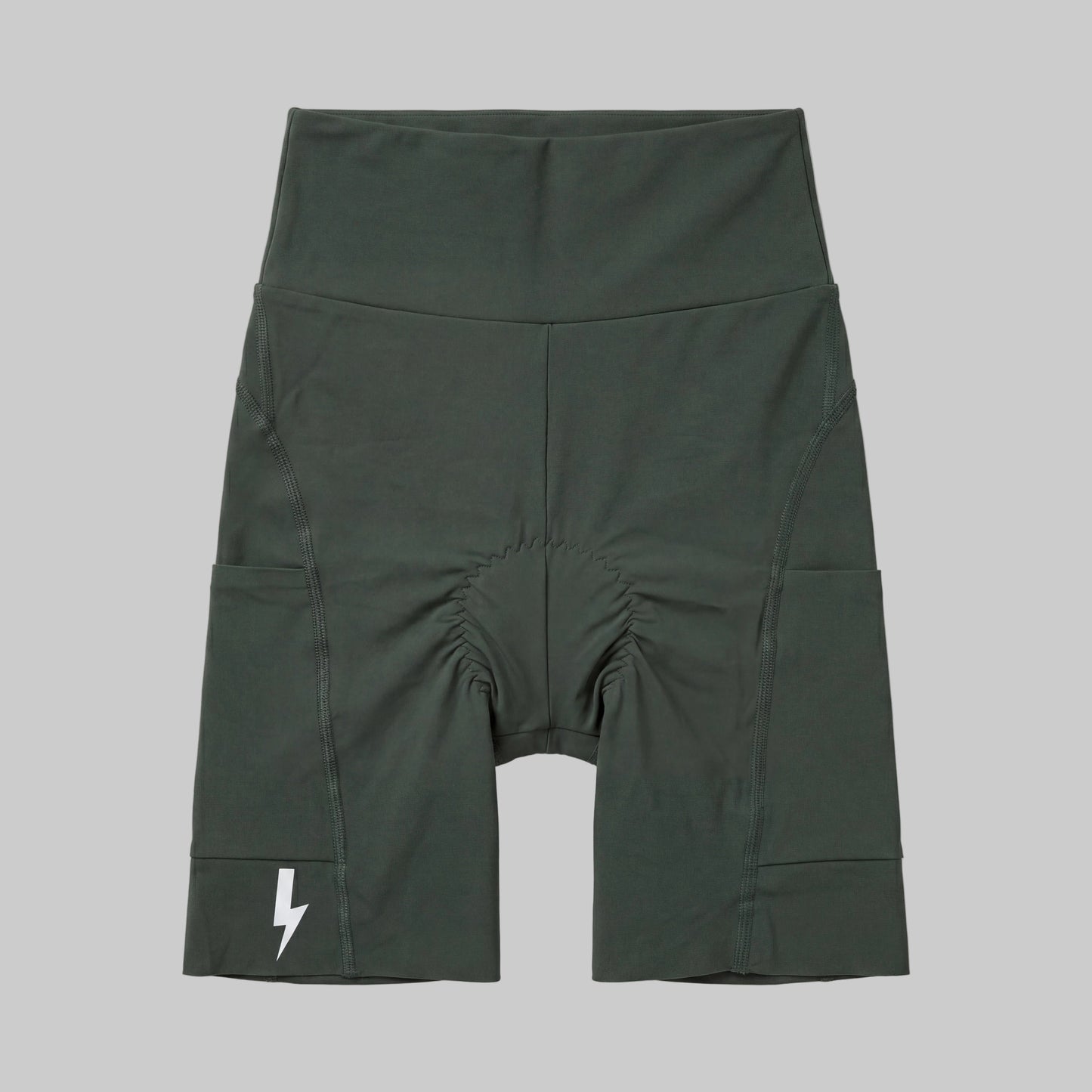 LUCA Empower women's high-waisted cycling shorts in basil, front flat lay