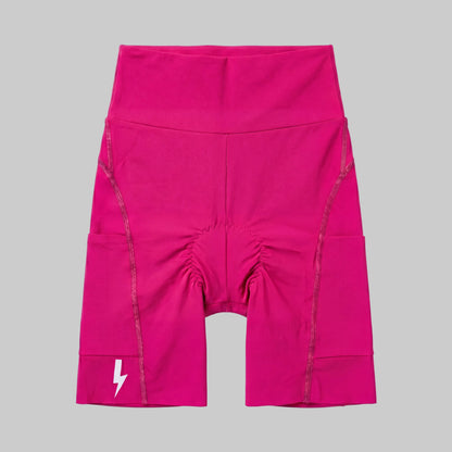 LUCA Empower women's high-waisted cycling shorts in hibiscus, front flat lay with chamois detail