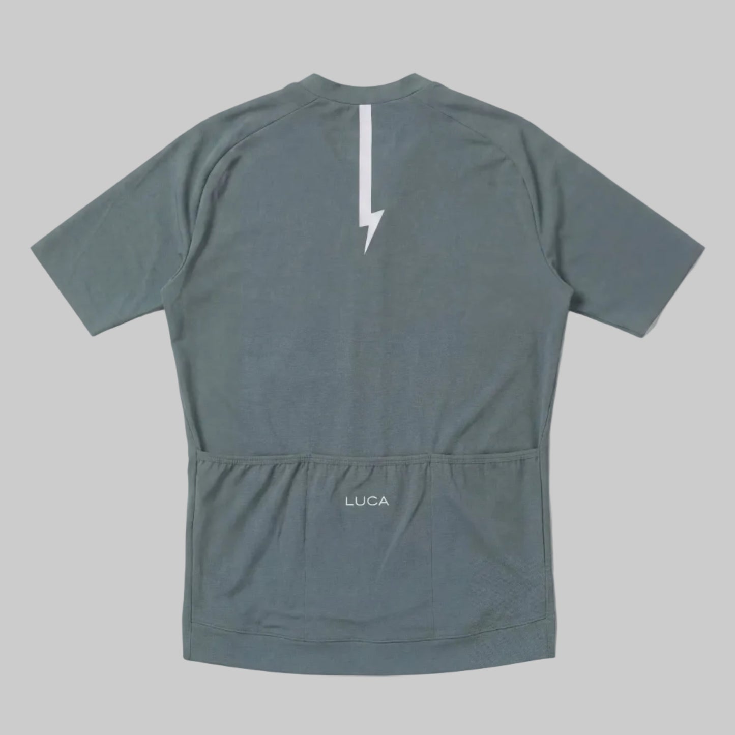 LUCA Soleil women's cycling jersey in matcha - back view with reflective bolt and pocket detail