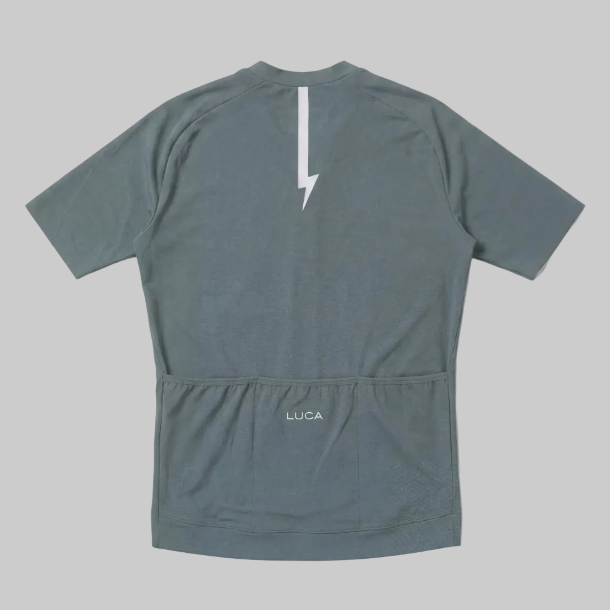 LUCA Soleil women's cycling jersey in matcha - back view with reflective bolt and pocket detail