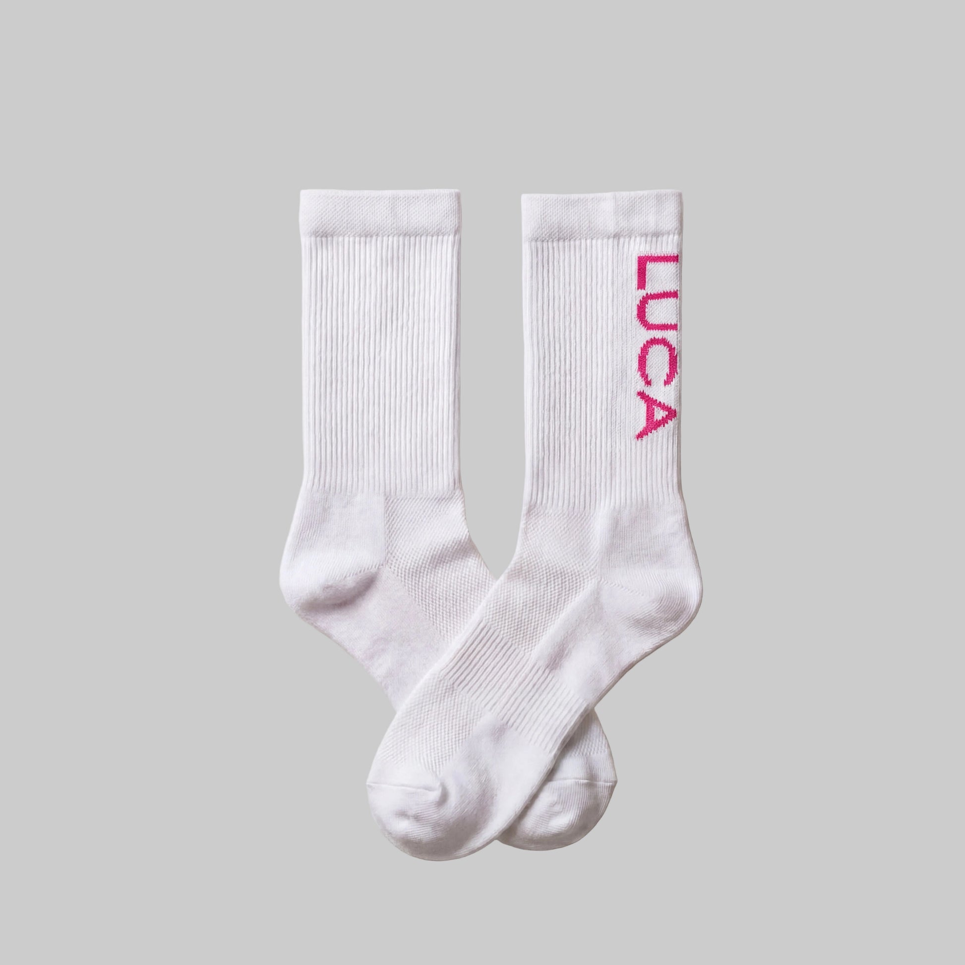 LUCA Traction long cycling socks in hibiscus colourway, flat lay